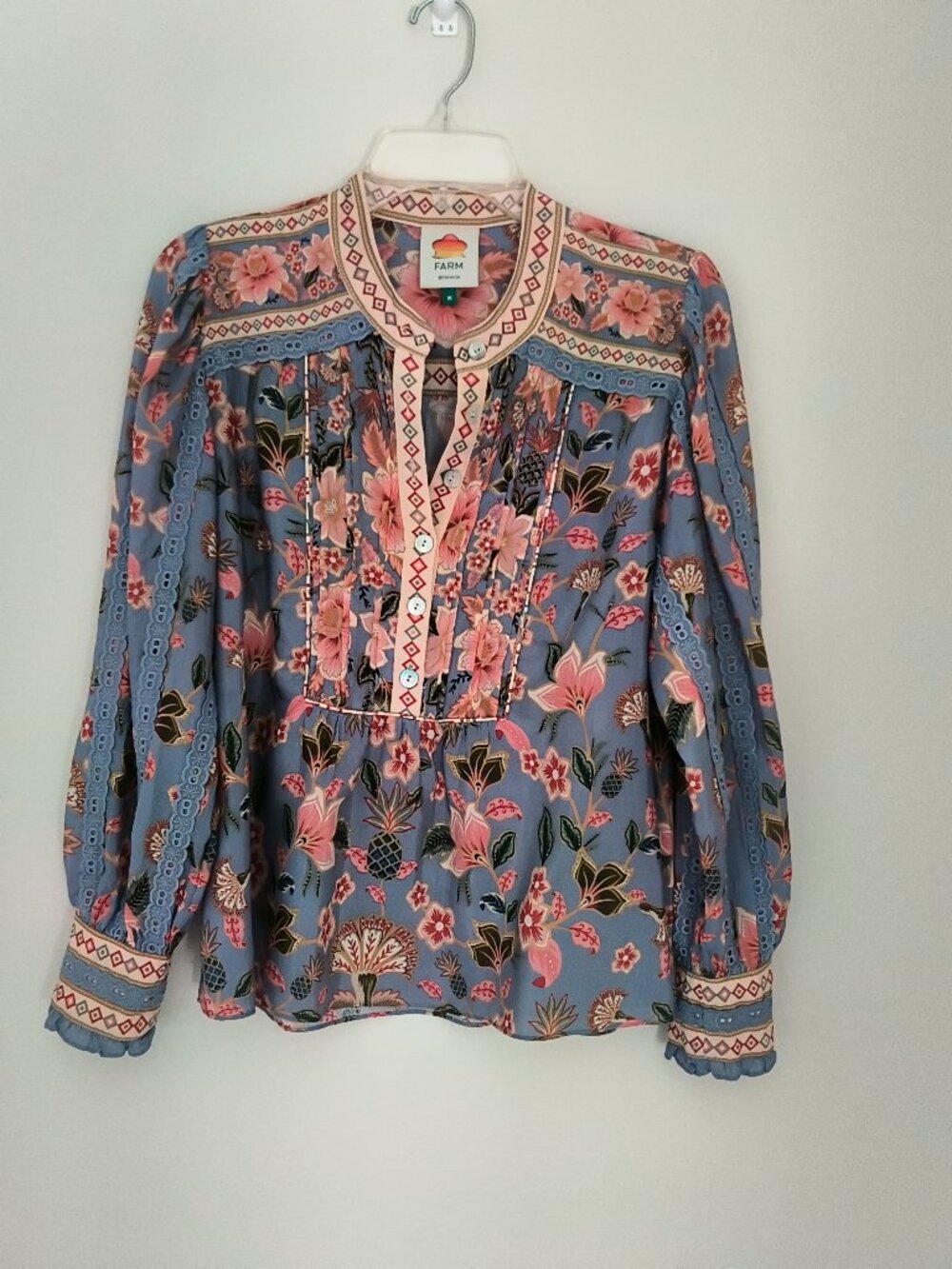 FARM Rio  blue top, long sleeves and a button front size M